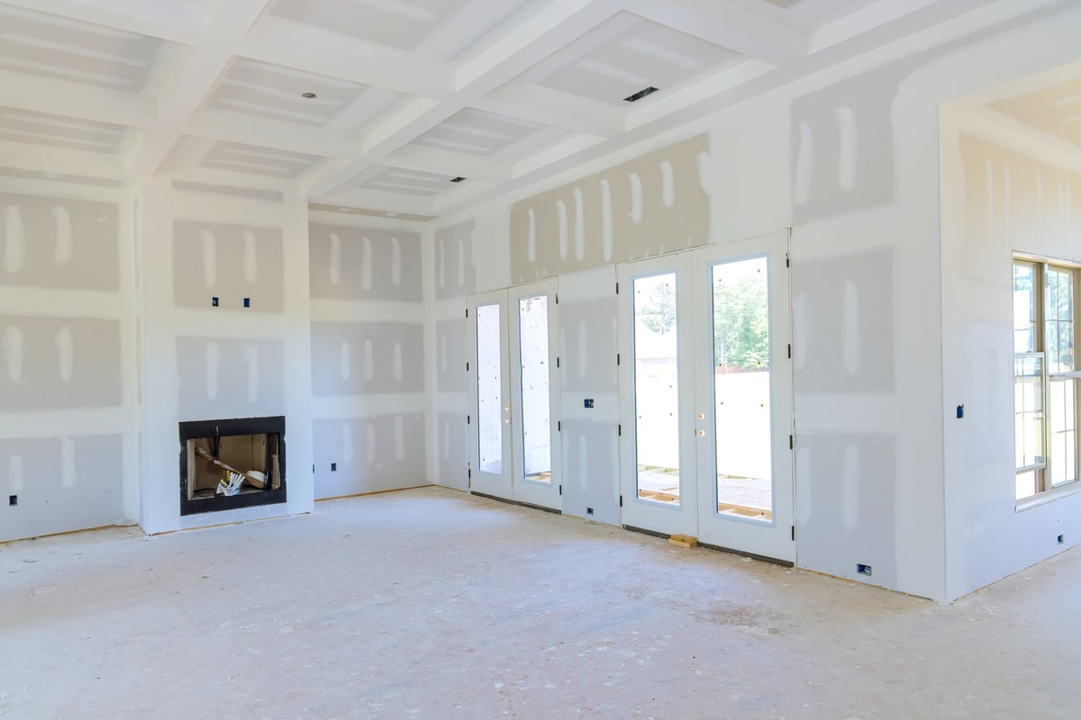 Plastering drywall in preparation for painting